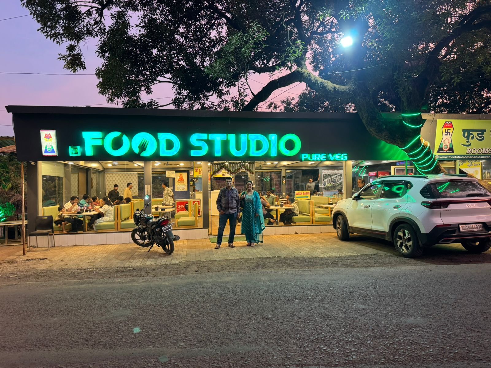 Food Studio Pure Veg restaurant exterior at night